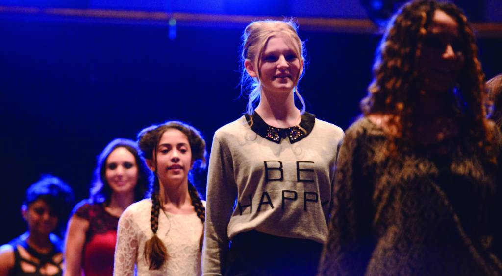 a photo of models on a runway in Fashion show