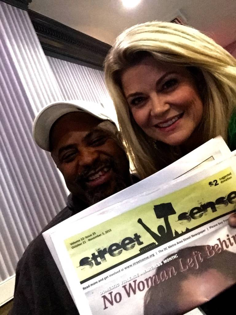 Scott Lovell takes a selfie with the reporter Kimberly Suiters.