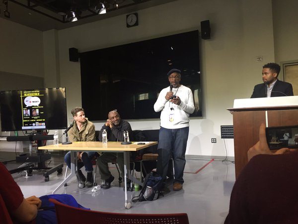 Ken Martin speaks during a panel promoting local community work.