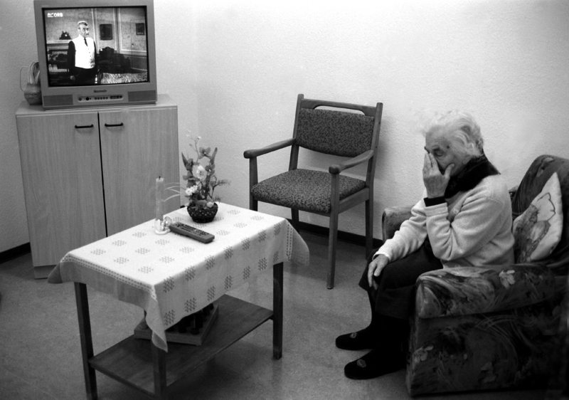 A photo of an elderly woman.