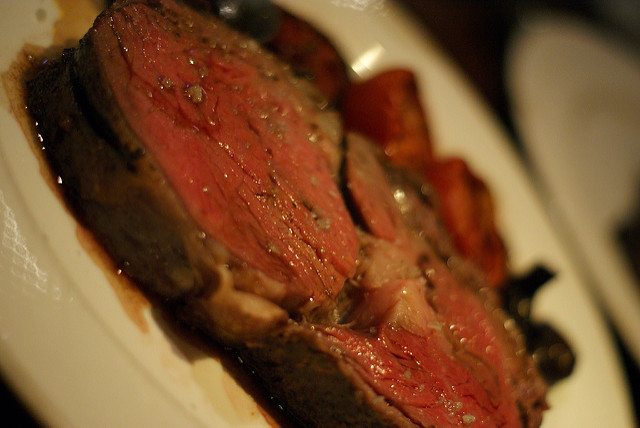 A photograph of prime ribs.