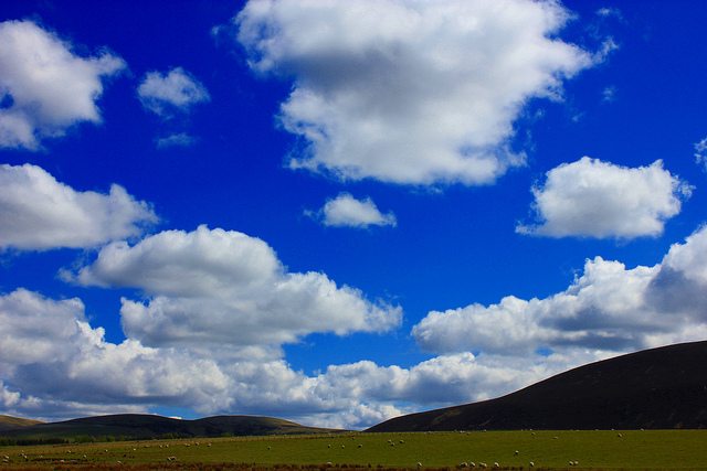 Blue skies over hills