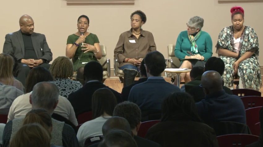 Panelists speak at the Progress Amidst Uncertainty event regarding D.C.'s upcoming budget proposal.