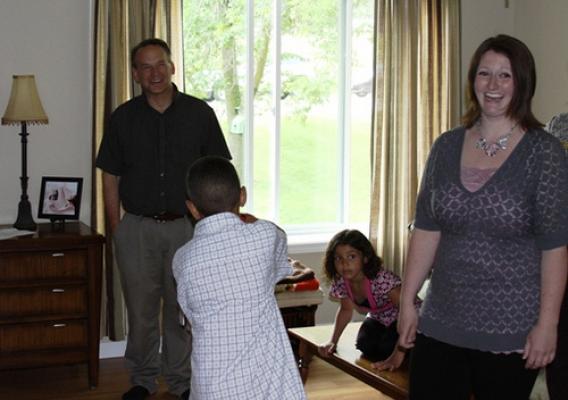 Photo of a woman and her family