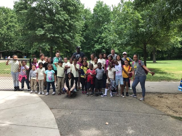 A photo of a group of students at a park