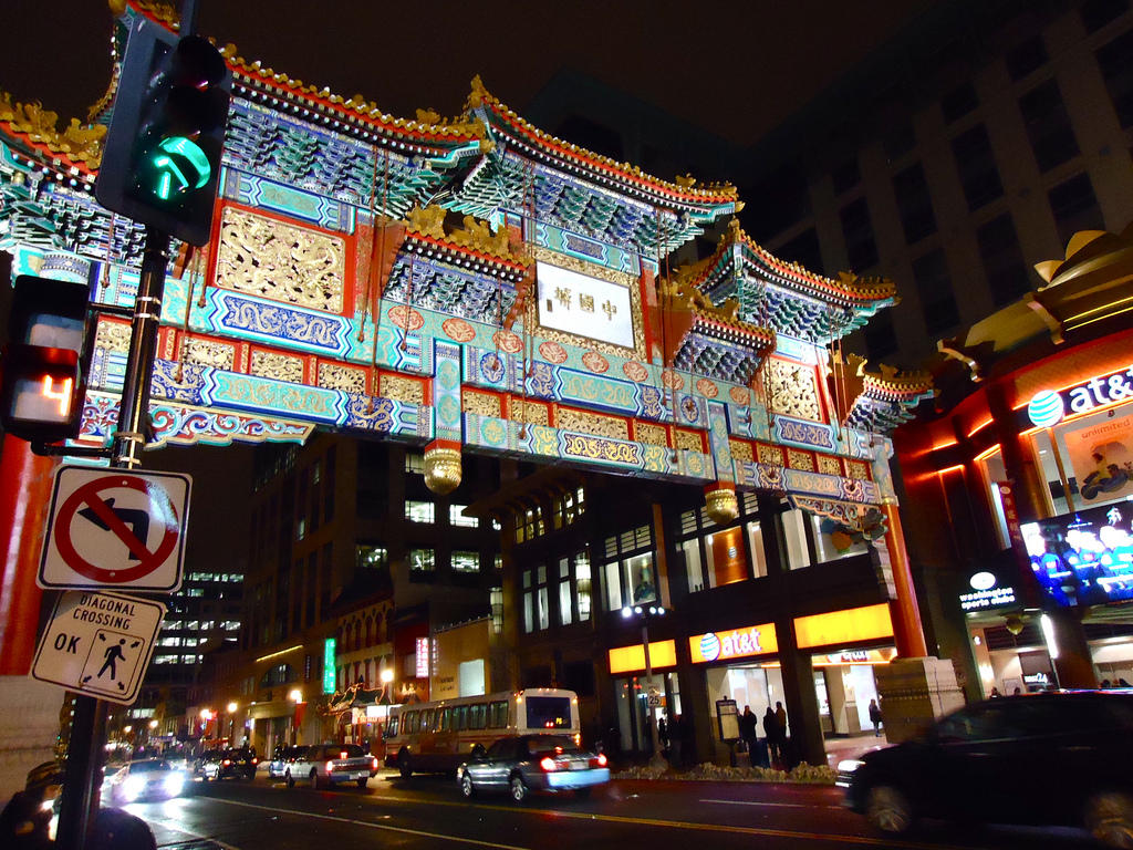 A photo of the Chinatown arch at night in DC.