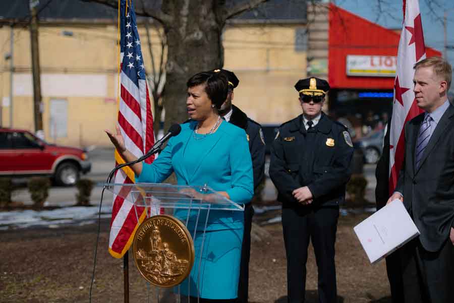 DDOT executive staff joins Mayor Muriel Bowser at an announcement about the improvements at a major intersection in Ward 8.