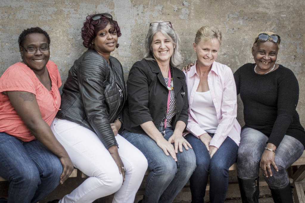 Women of Calvary Women's Services pose for a photograph