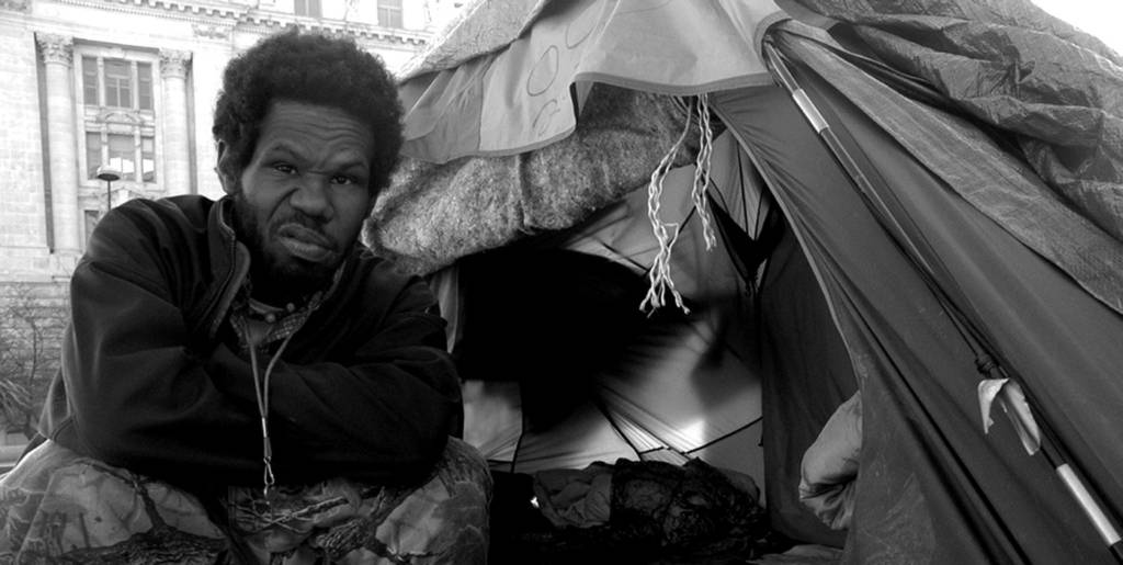 Tariq Asbury, who has protested in Freedom Plaza since October, has no interest in moving over to McPherson.