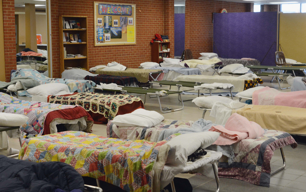 Image of beds in a homeless shelter.