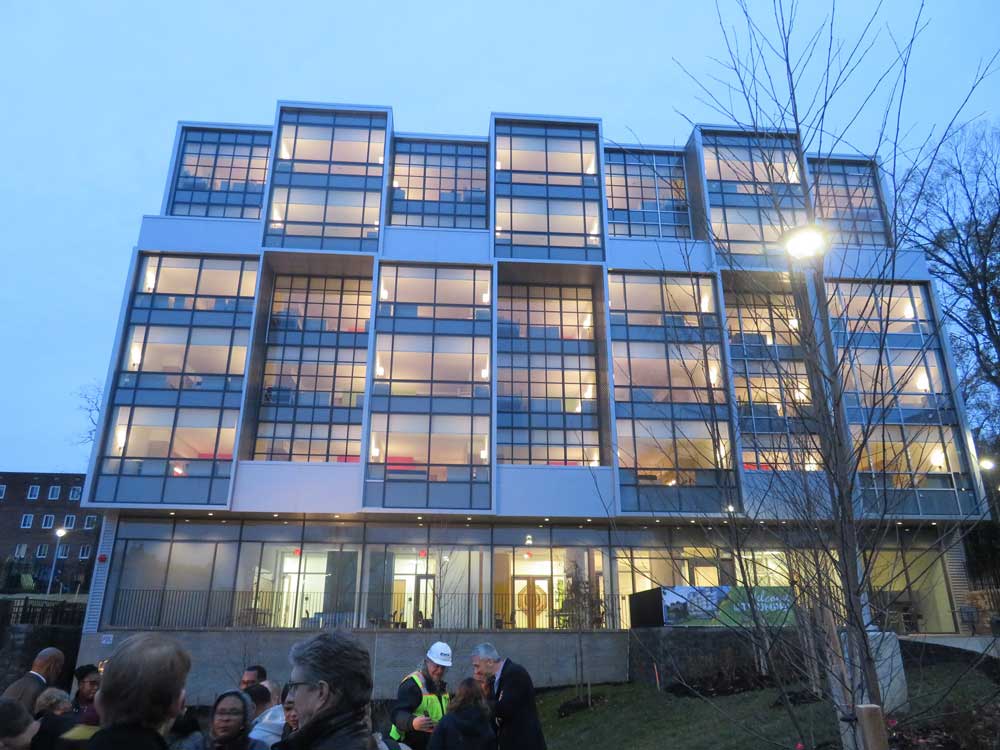 Photo of the family shelter exterior at dusk.