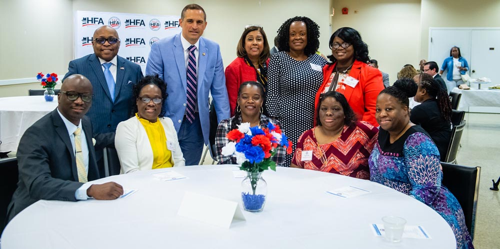 Group photo of government staff and program participants.