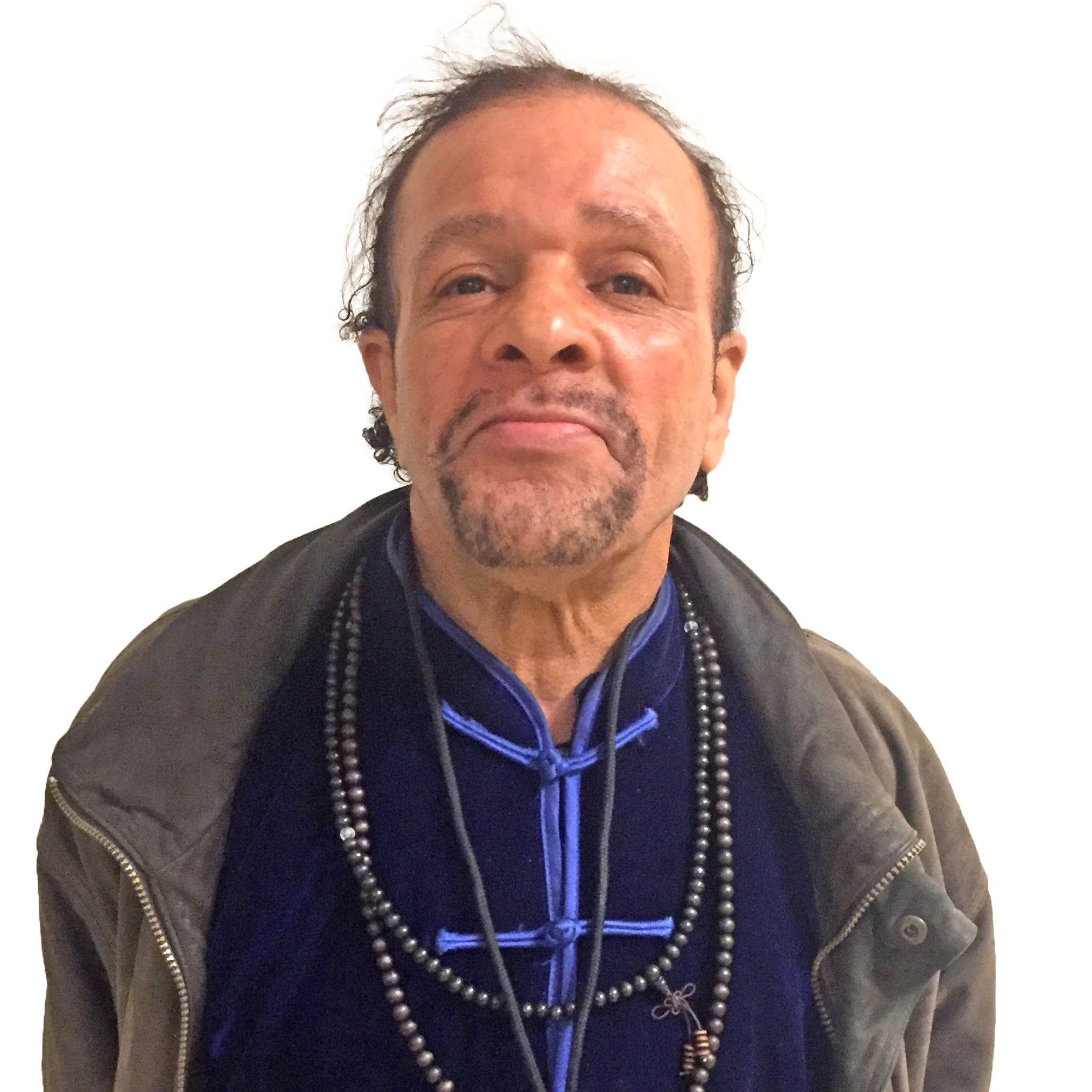 Portrait photo of Ayub Abdul from the shoulders up.
