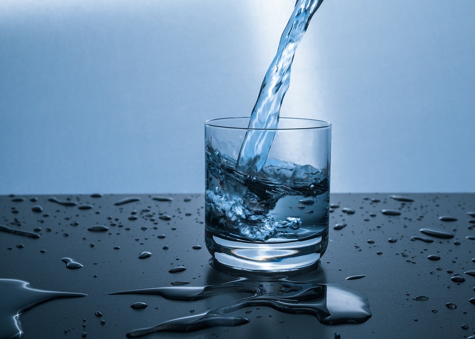 Photo of water being poured into a glass