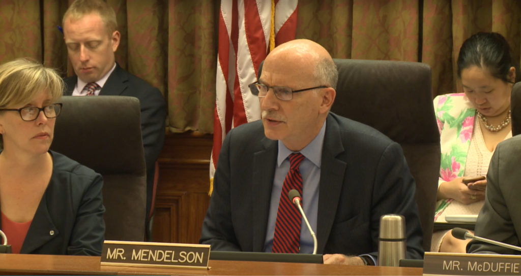 DC Council Chair Phil Mendelson sits in a meeting at Union Temple Baptist Church