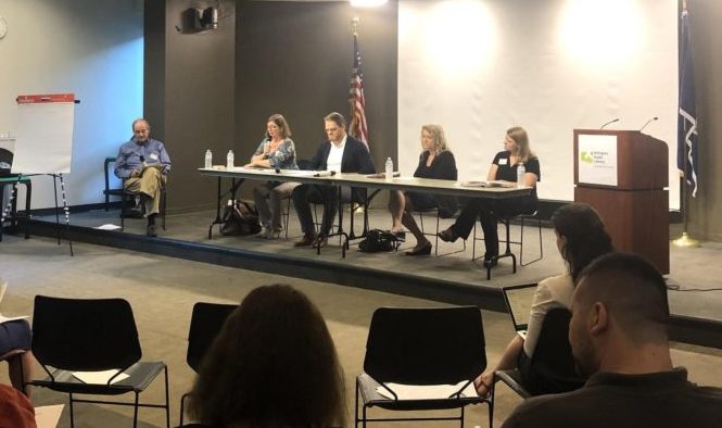 Photo of the panel and audience in Arlington Central Library.
