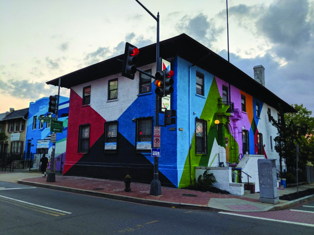 A photo of a colorful building that serves as a clinic.