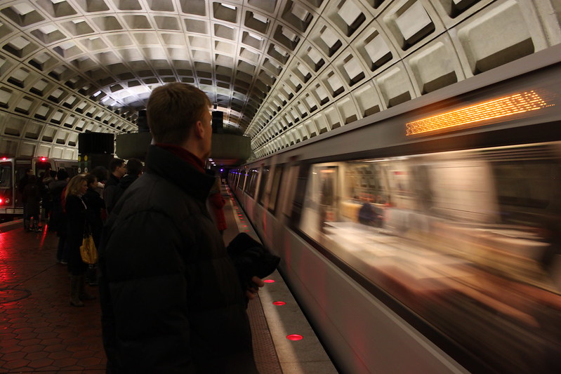 a man waits for the metro