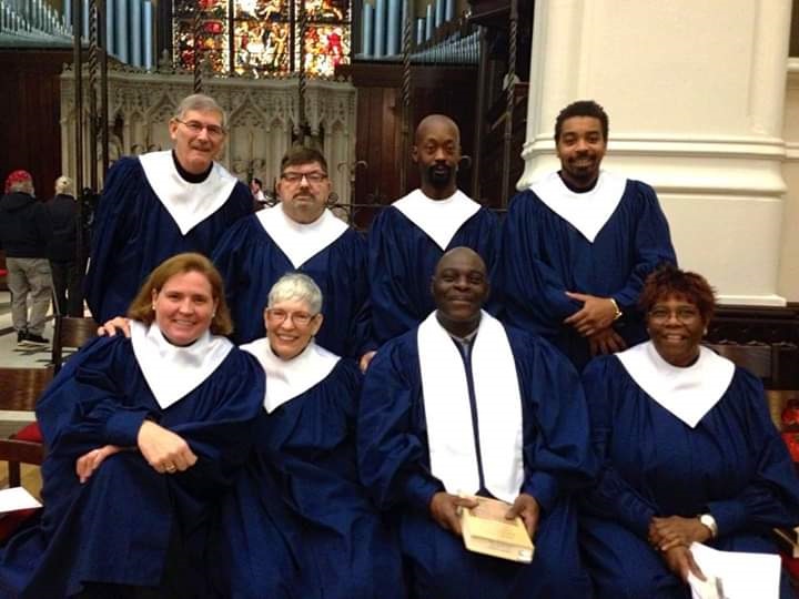 The Welcome Table choir poses for a photo.