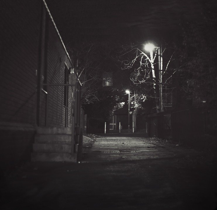 A dark street at night
