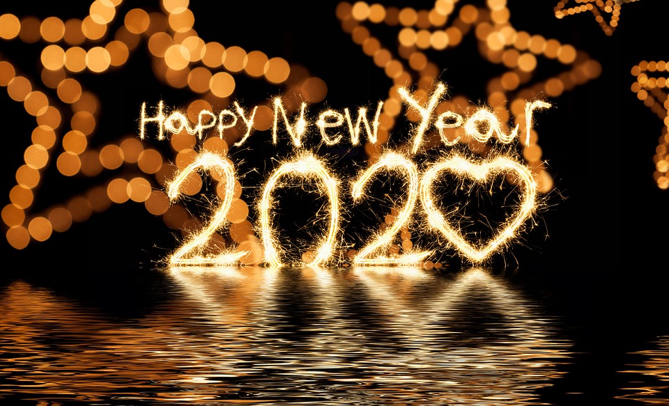 Star shapes made out of golden lights are in the background. Happy New Year 2020 is written out with lines of fire