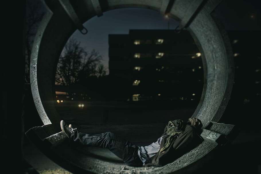 Photo of homeless man lying down