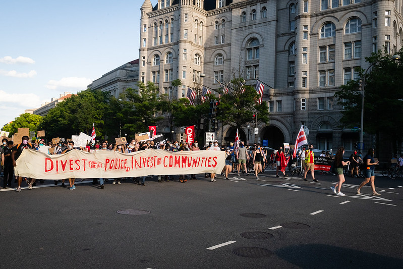 Protesters marching past Trump International Hotel