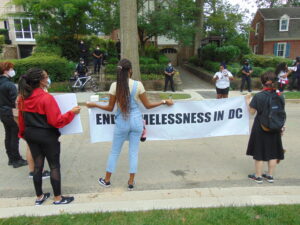 Photo of protesters across the street from MPD