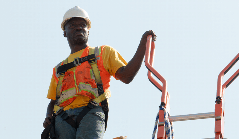 Andre Roberson stands on a rooftop. Photo courtesy of the DC Sustainable Energy Utility