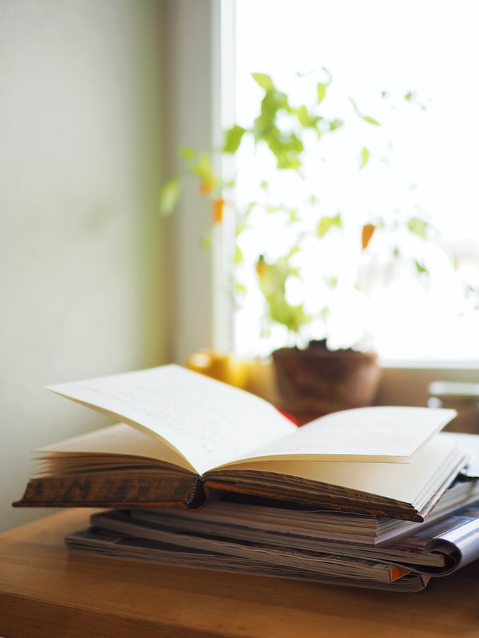 A book is open on a table.