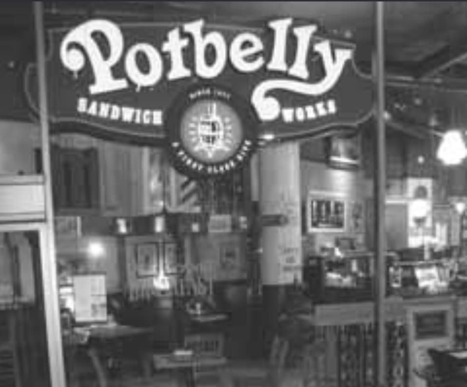 A photo of a Potbelly Sandwich Works store front.