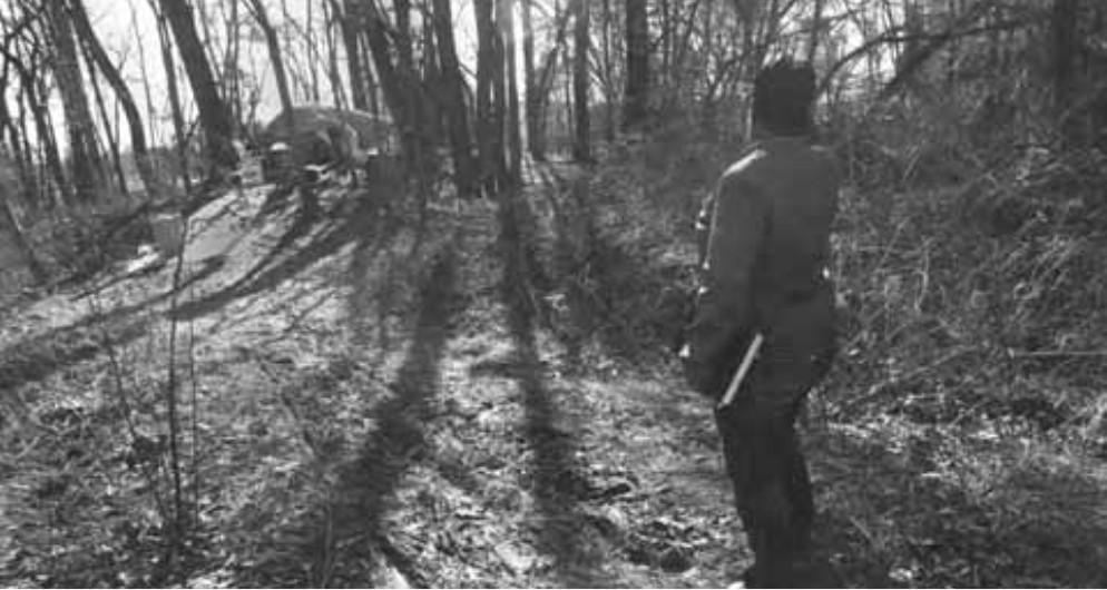 The image depicts a counter approaches a camp to gather data on the people dwelling there.