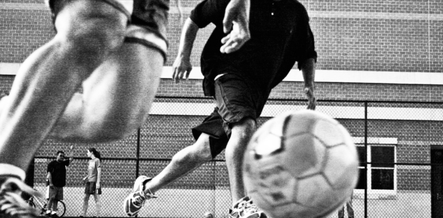 Photo of players playing soccer.