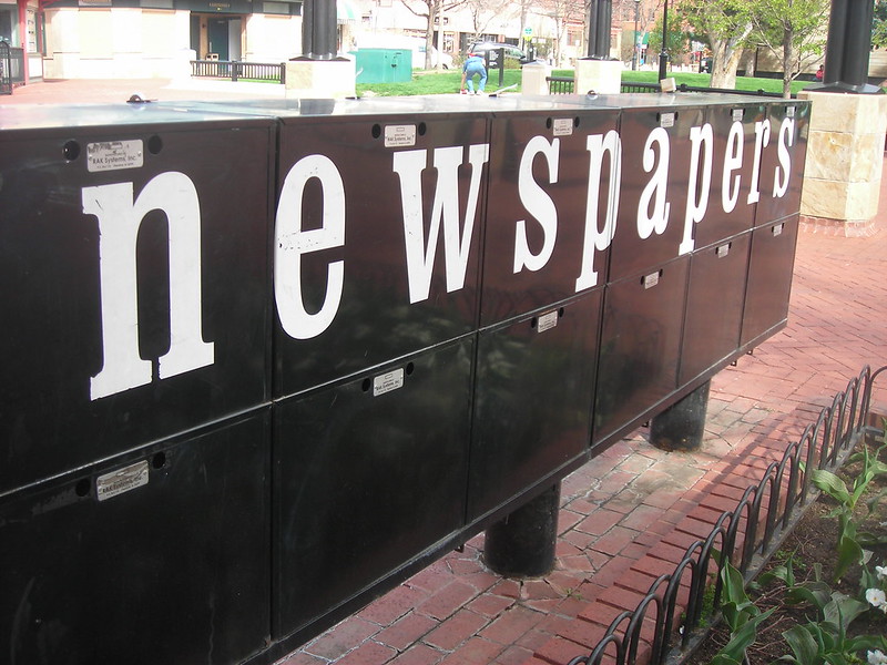 A photo of newspaper boxes
