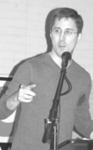 Philip Clark speaks to the audience.