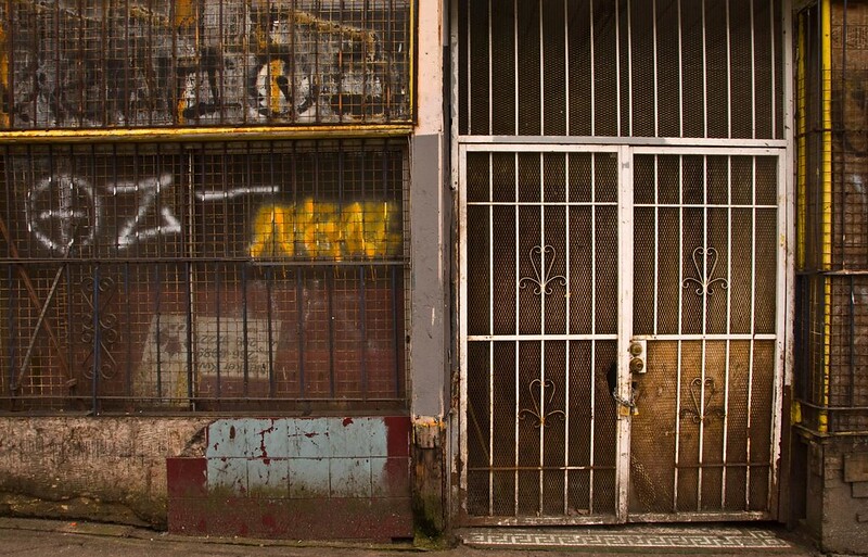 Photo of a building in East Side Vancouver that is covered in graffiti.