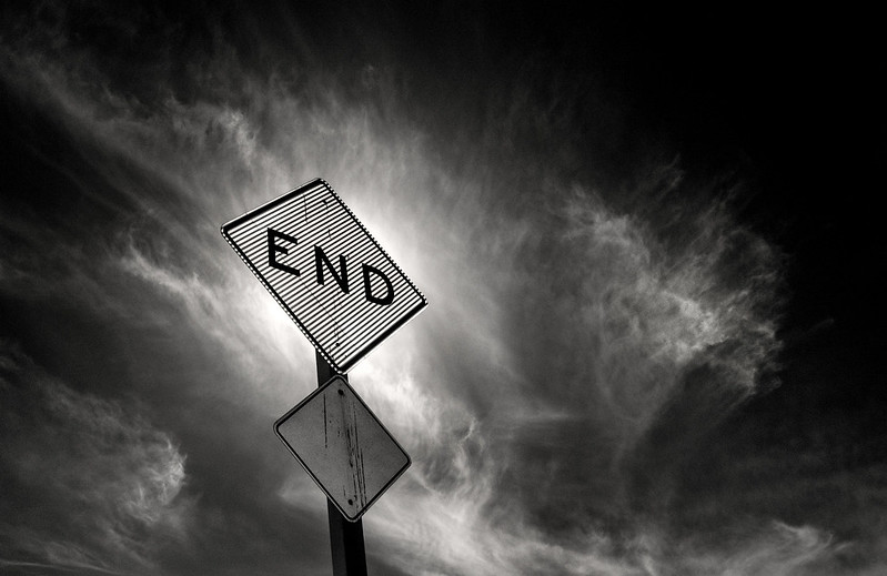 Black and white photo of a stylized sign that says "END"