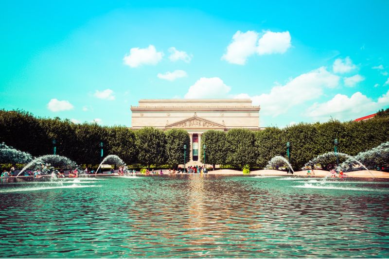 Photo of the National Archives from behind the Smithsonian Sculpture Garden Fountain
