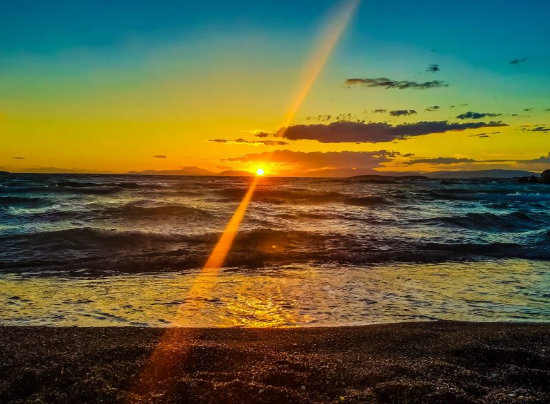 Photo of a sunrise over the ocean
