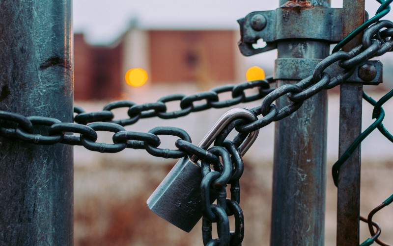 Photo of gates held closed with a padlock