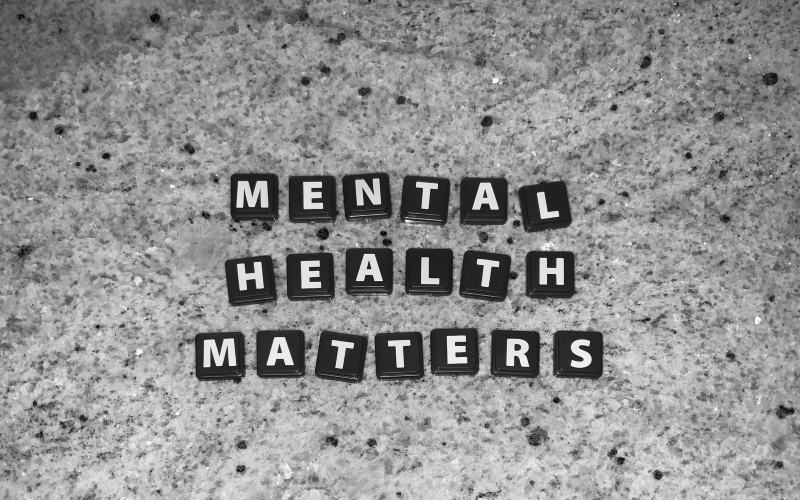 Photo of letter tiles spelling out "mental health matters"