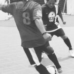 Members of the D.C. Knights play in a soccer match