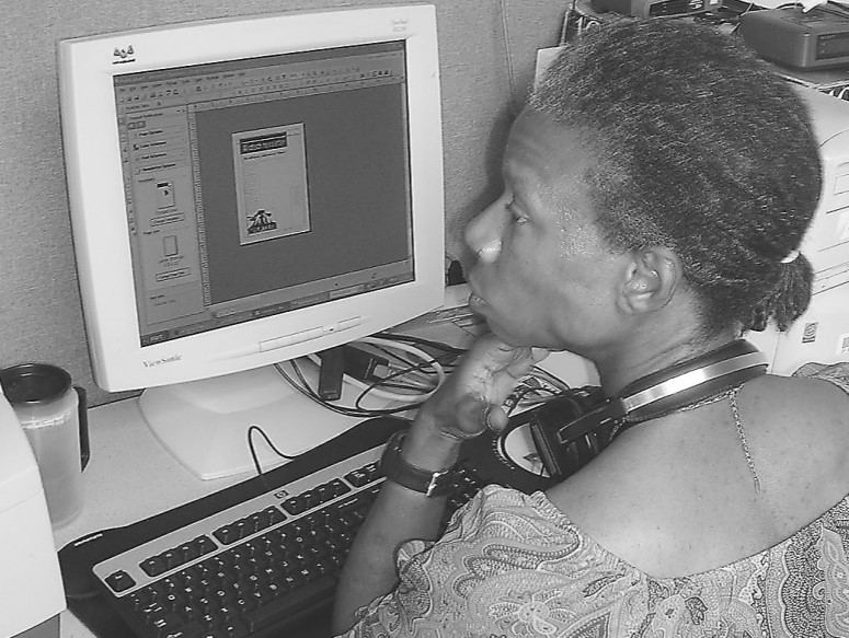A photo of Reynolds working in front of a computer