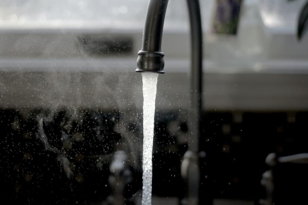 Picture of a running sink.