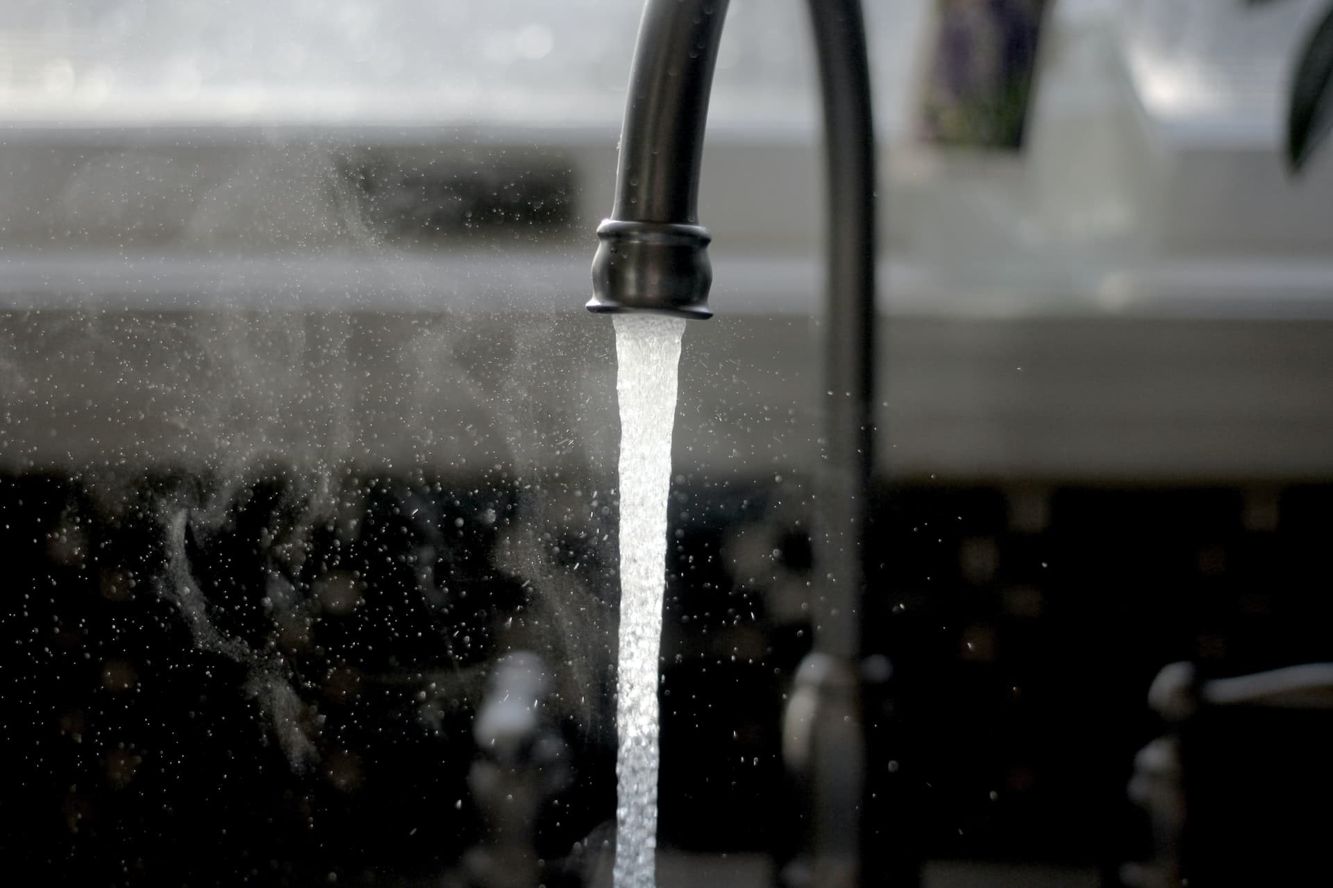 Picture of a running sink.