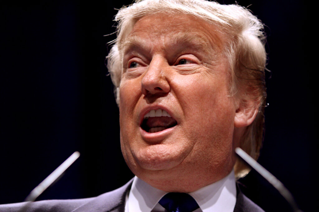 A close up of Donald Trump speaking.